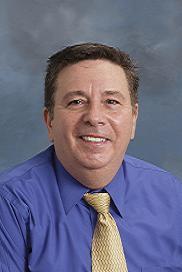 Dr. David M. Berube